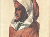 une vieille photo d'un homme portant un turban et une pipe à la bouche