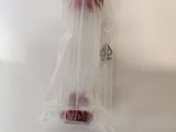 a piece of meat wrapped in a plastic bag