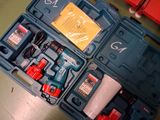 a blue tool box with tools in it on a table