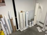 many rolls of paper and rolls of paper on the floor