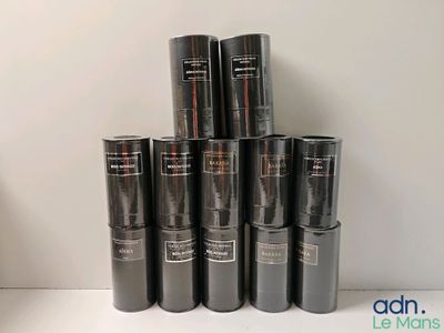 a stack of black cans sitting on top of a table