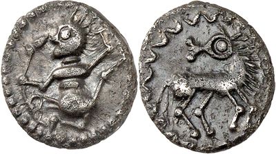a close up of a coin with a horse on it