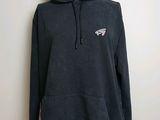 un sweat à capuche noir orné du logo des Philadelphia Eagles