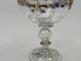 a glass bowl with a blue and white design on it