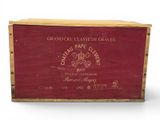 a wooden box with a wine label on it