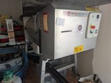 a machine that is sitting in the corner of a room
