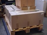 a stack of boxes on a pallet in a warehouse