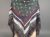 an image of a woman ' s shawl on a mannequin head