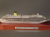 a model of a cruise ship on display on a table