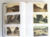 a book opened to show pictures of a road