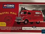 an image of a box with a picture of a red mail truck on it