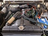 a car engine that has a lot of wires in it