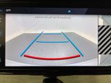 a picture of a car ' s rear view mirror with a picture of a basketball court on it