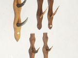 four pieces of wood with antelope on them