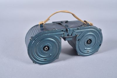 a blue toy radio that is sitting on a table