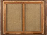 a close up of a wooden frame with a window on it