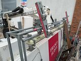 a lot of junk on the ground next to a building