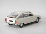 a toy car that is sitting on a white surface