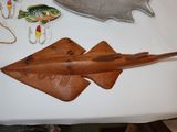 a table with a variety of fishing related items on it