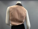 an image of a mannequin mannequin wearing a pink top and black skirt
