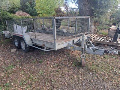 an image of a trailer with a cage on the back of it