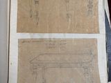 two drawings of a table on a piece of paper