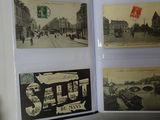 a person holding a book with pictures of a city