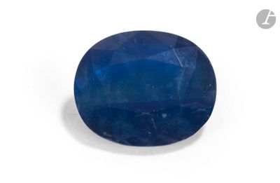 a close up of a blue sapphire stone on a white background