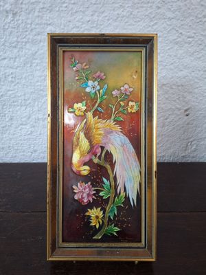 une image représentant une image d'un oiseau sur laquelle figurent des fleurs