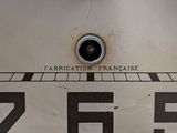 a close up of a sign on the side of a toilet