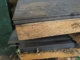 some pieces of wood are stacked on top of each other