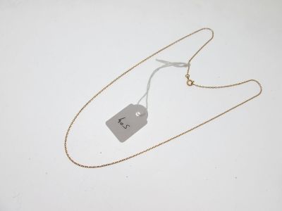 gros plan d'un collier auquel est attachée une étiquette