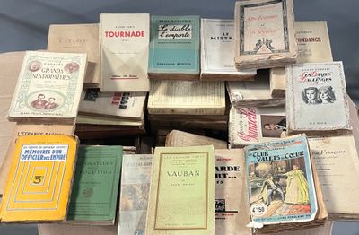 a lot of old books on a table together