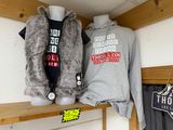a display of clothing on a shelf in a store