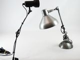 a lamp that is sitting on a table next to a microphone