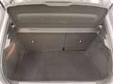 a trunk of a car that is empty with the door open