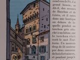 an open book with a picture of a building in it