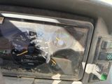 a close up of a car dashboard with a speedometer