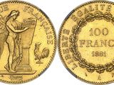 a gold coin with an image of a woman holding a bird