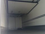 an image of a truck that is parked in a garage