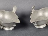 pair of silverplated vases with handles and handles