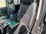 the interior of a car with black leather seats and black leather trims