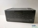 a black plastic box on a table with a white background