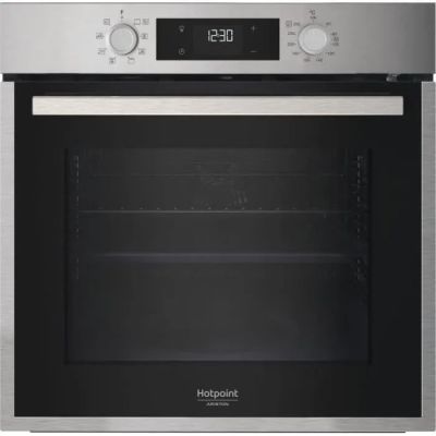 a close up of a stainless steel oven with the door open