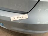 a picture of a car with a sticker on it ' s bumper