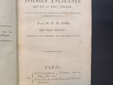 an old book opened to show the title of a poem