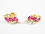 une paire de boucles d'oreilles en rubis et diamants
