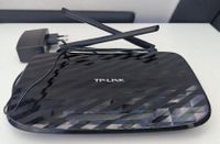 Routeur Wi-Fi de marque TP-LINK, modèle Archer C2, AC750 dou…