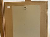 an image of a painting on a wooden easel with a white background
