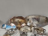 a table with a lot of silverware on it